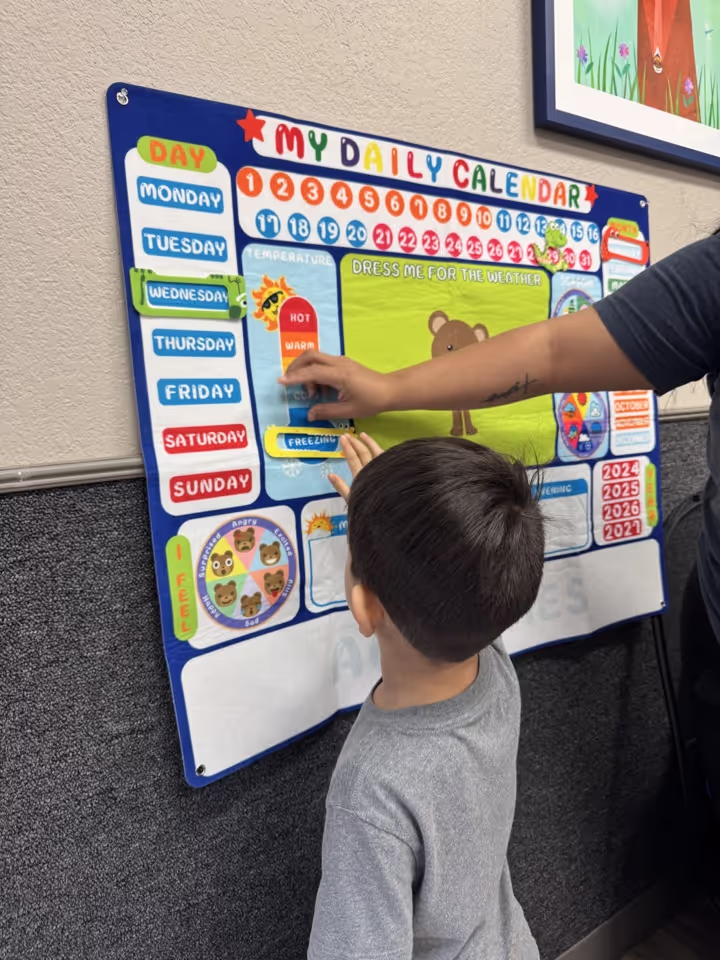 Child using a learning board